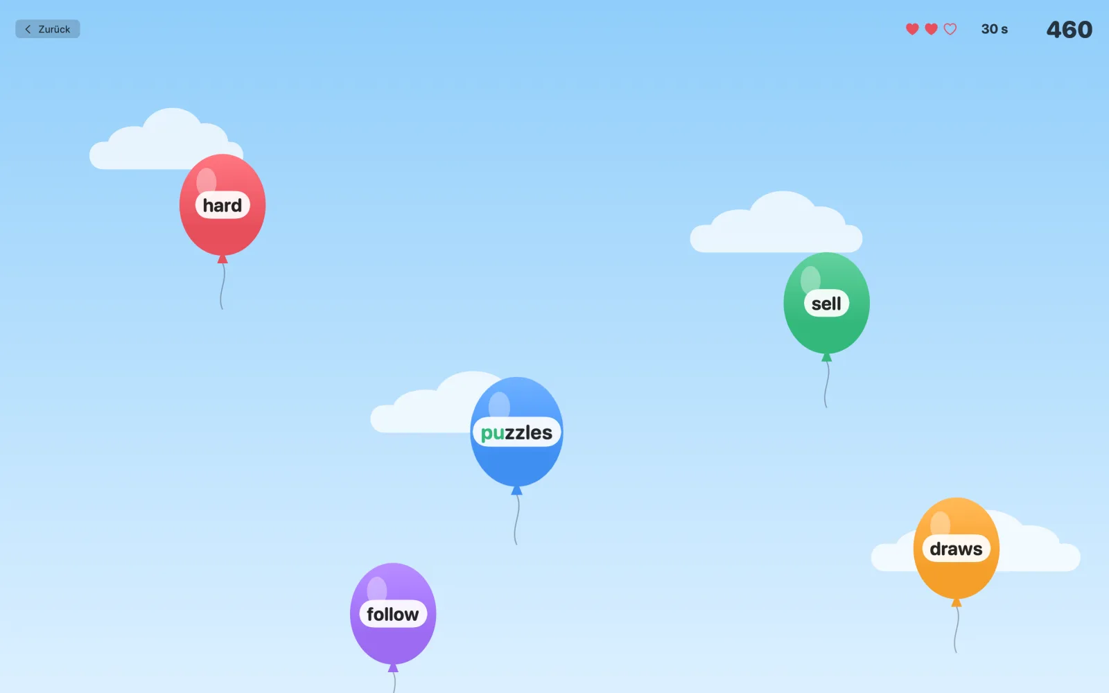 Das Ballonspiel: Wörter steigen auf bunten Ballons auf und platzen, wenn sie getippt werden.